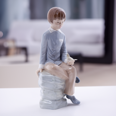 Фарфоровая статуэтка "Птица в руках" от Lladro