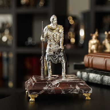 Handmade figurine "Cossack" made of bronze and brass with gilding