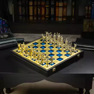 Greco-Roman period themed gold and silver chess set by Manopoulos