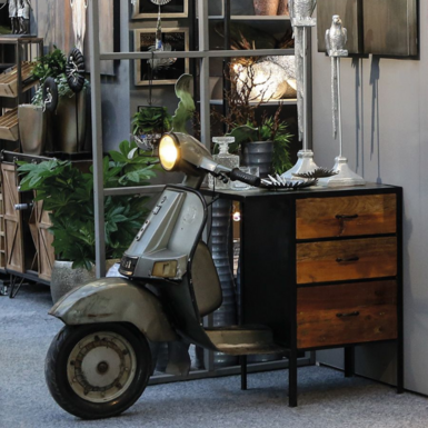 Decorative dresser with scooter and lamp by Casablanca