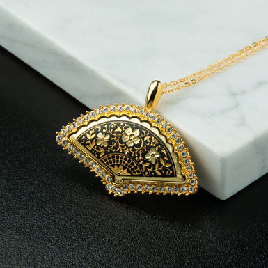 Damascus steel pendant with gold plated "Graceful fan" from Anframa