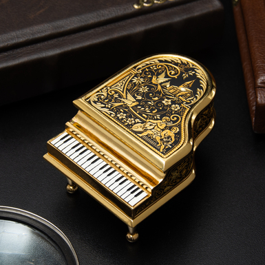 Anframa Damascus Steel and Gilt "Miniature Piano" Figurine