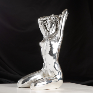Silver sculpture "Nude woman"