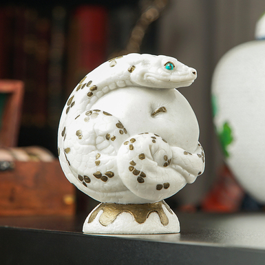 Author's sculpture made of artificial marble "White Snake"