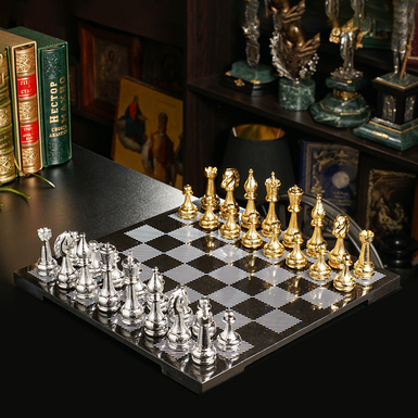 Chess set "Acumen" with marble board and metal pieces with gold and silver coating from ITALFAMA