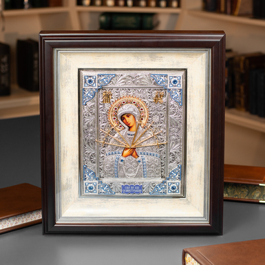 Icon of the Mother of God "Seven-shot" with gilding and silvering