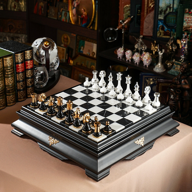Chess set "Royal game" with wooden board and figures with gold and silver plating from ITALFAMA