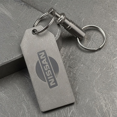 Titanium keychain "Nissan" with Swiss carabiner "Victorinox"