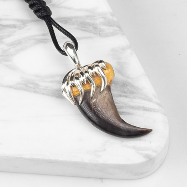 "Tooth" pendant made of 925 silver and ruby