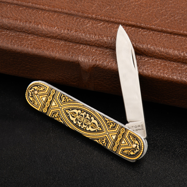 "Ancient" folding knife with gold plating from the Anframa