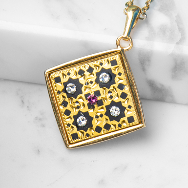 Pendant "Treasure" made of gold-plated Damascus steel by Anframa brand