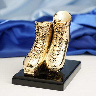 Gilded statuette "Skates" by Exetera Argenti