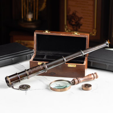 "Pirates of the Caribbean" gift set with magnifying glass, telescope and compass in a wooden case by Ross London