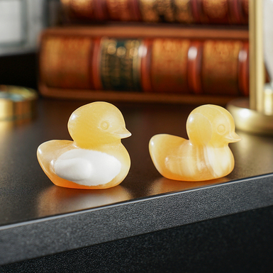 A pair of yellow calcite ducks Yellowy from Stone art designe