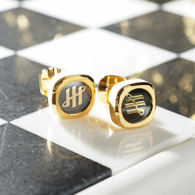 "Quatro" cufflinks in stainless steel, sapphire and yellow gold by Montegrappa