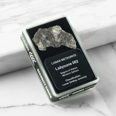 Certified meteorite "Laâyoune 002", 1,58 g (Western Sahara)