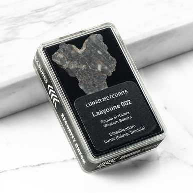 Certified meteorite "Laâyoune 002", 1,67 g (Western Sahara)