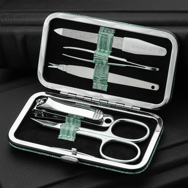 Emerald 5-piece stainless steel manicure set in a leather case by Fama