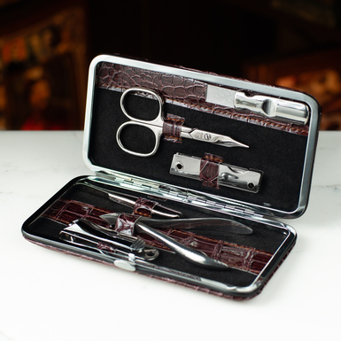 Burgundy 6-piece stainless steel manicure set in a leather case by Fama