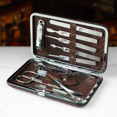 Royal 10-piece stainless steel manicure set in a leather case by Fama